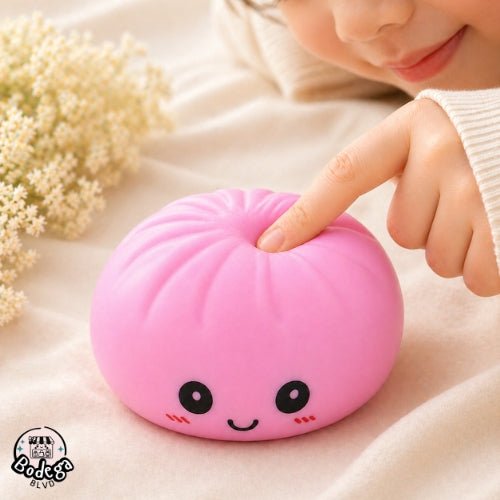 Pink dumpling squishy stress toy