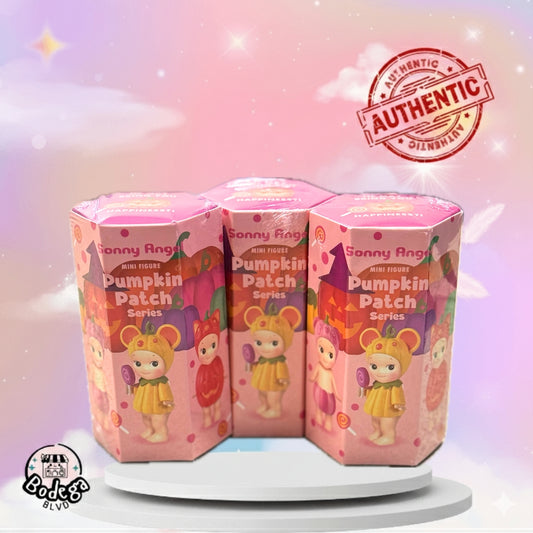 Three Sonny Angel Pumpkin Patch Series individual blind box packages showing mini figure collectibles with seasonal fall designs